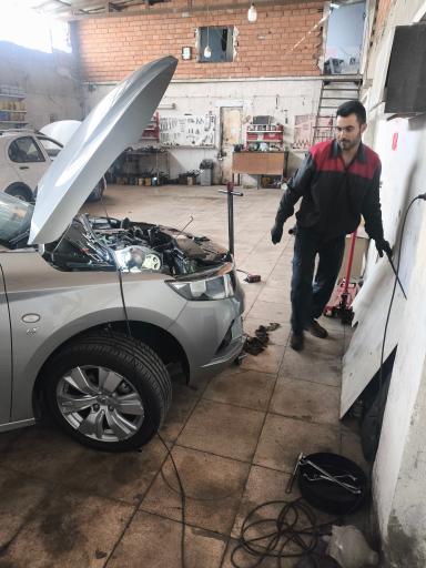 عکس تعمیرگاه تخصصی مکانیکی و برق میلور