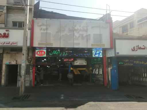تعمیرگاه خودرو تکنیک کار