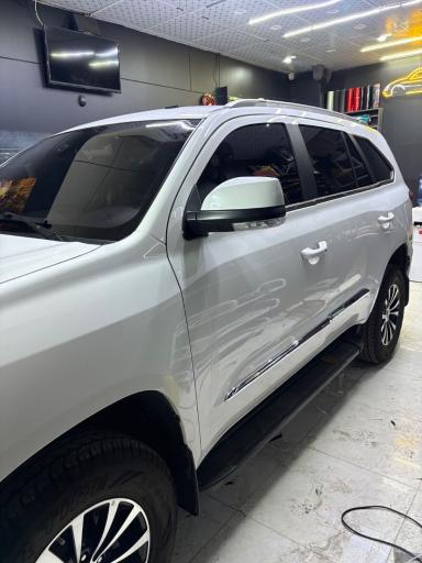 عکس شیشه دودی اتووکس