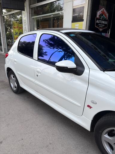 عکس شیشه دودی اتووکس