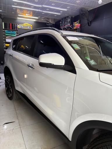 عکس شیشه دودی اتووکس