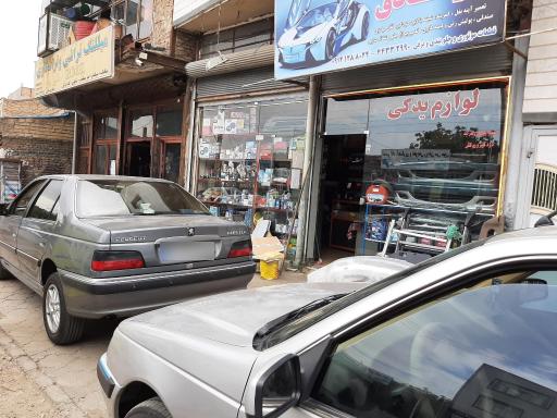 عکس مرکز تعمیر آینه و کمربند خودرو