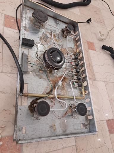 عکس تعمیرات اجاق گاز بخاری شومینه