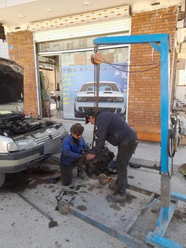 عکس تعمیرگاه ماهر