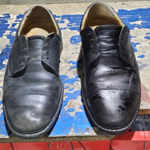 عکس تعمیرات کیف و کفش معلم