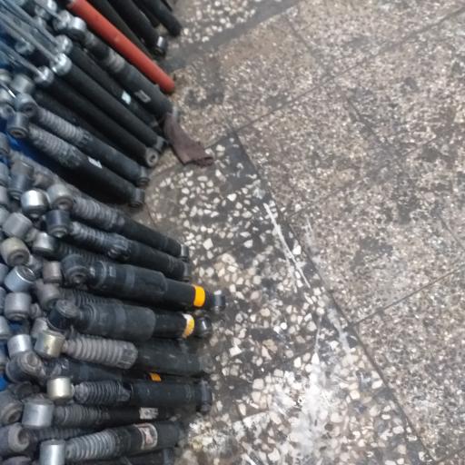 عکس کمک فنر علی