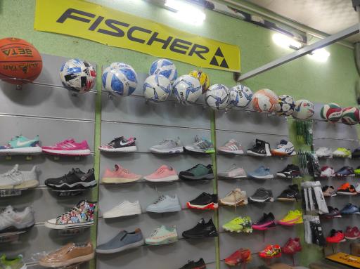 عکس فروشگاه ورزشی کارتال