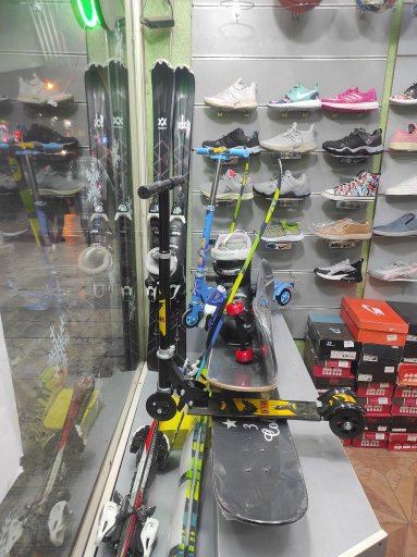 عکس فروشگاه ورزشی کارتال