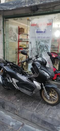 عکس تعمیرگاه موتورسیکلت المپیک