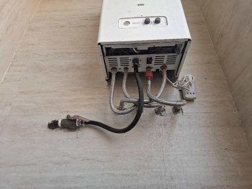 عکس تعمیرات و لوازم پکیج آبگرمکن بخاری اجاق گاز
