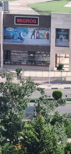 عکس فروشگاه میگروس