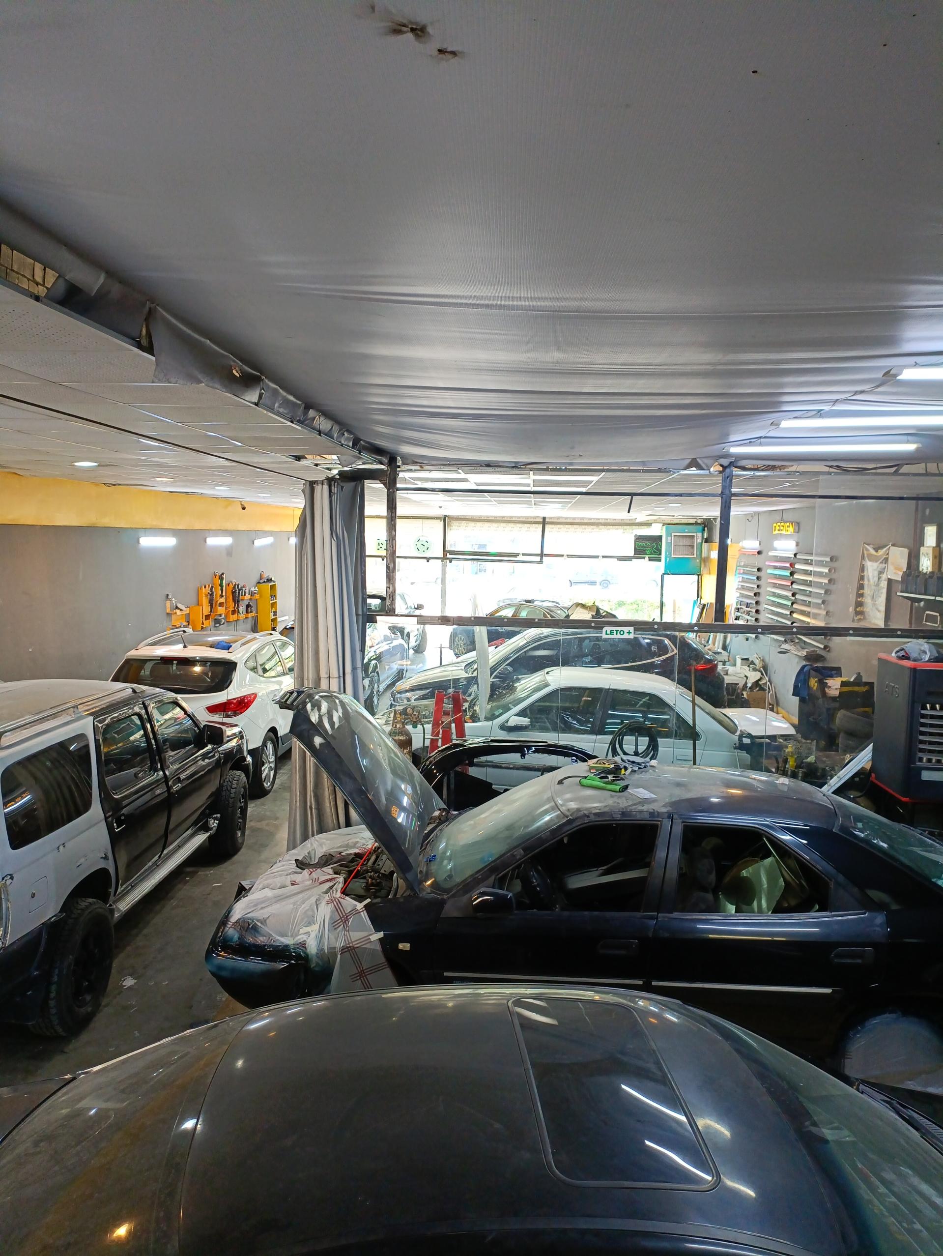 عکس تعمیرگاه بنز و بی ام و پورشه صفری