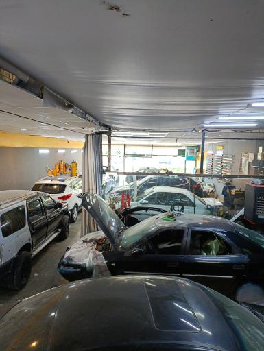 عکس تعمیرگاه بنز و بی ام و پورشه صفری