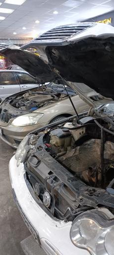 عکس تعمیرگاه بنز و بی ام و پورشه صفری