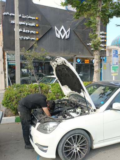 عکس تعمیرگاه بنز و بی ام و پورشه صفری