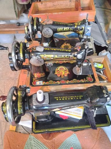 عکس تعمیر چرخ خیاطی صابری