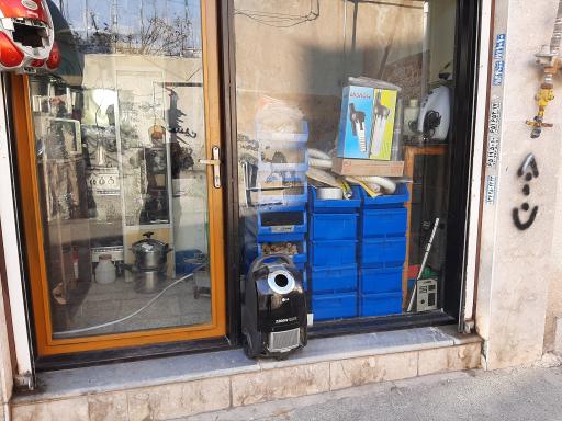 عکس تعمیرگاه لوازم خانگی