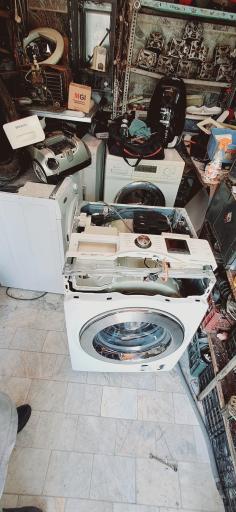 عکس تعمیرات لوازم خانگی علی آجرلو