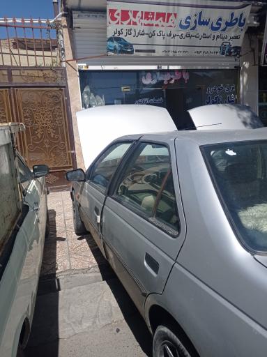 عکس باطری‌سازی تنظیم موتور و شارژ کولر همشهری