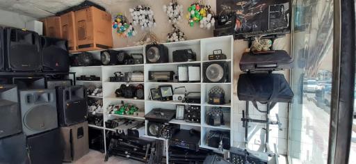 عکس فروشگاه پاپ ملودی