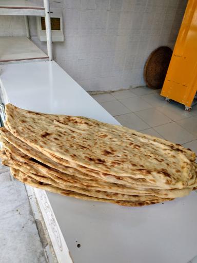 عکس نان سنتی تنوری بوی گندم