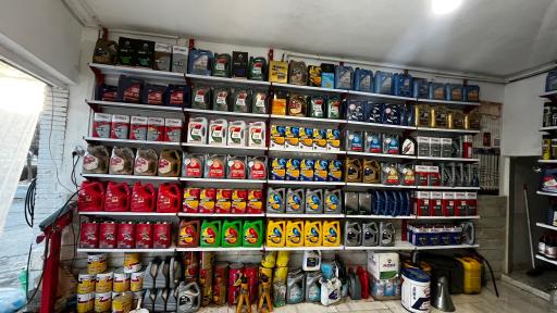 عکس تعویض روغن و خدمات لاستیک میلاد