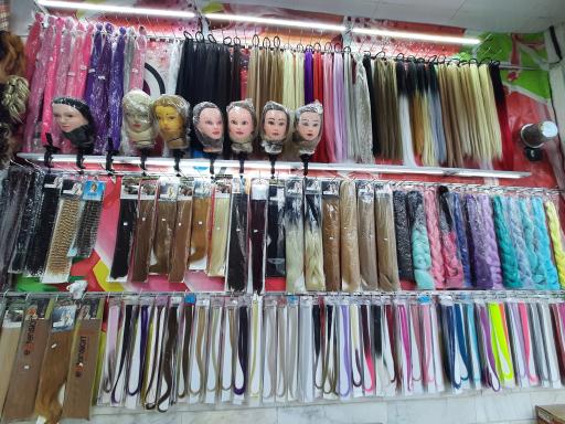 عکس فروشگاه لوازم آرایشی ملکه