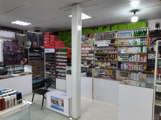 عکس فروشگاه لوازم آرایشی ملکه