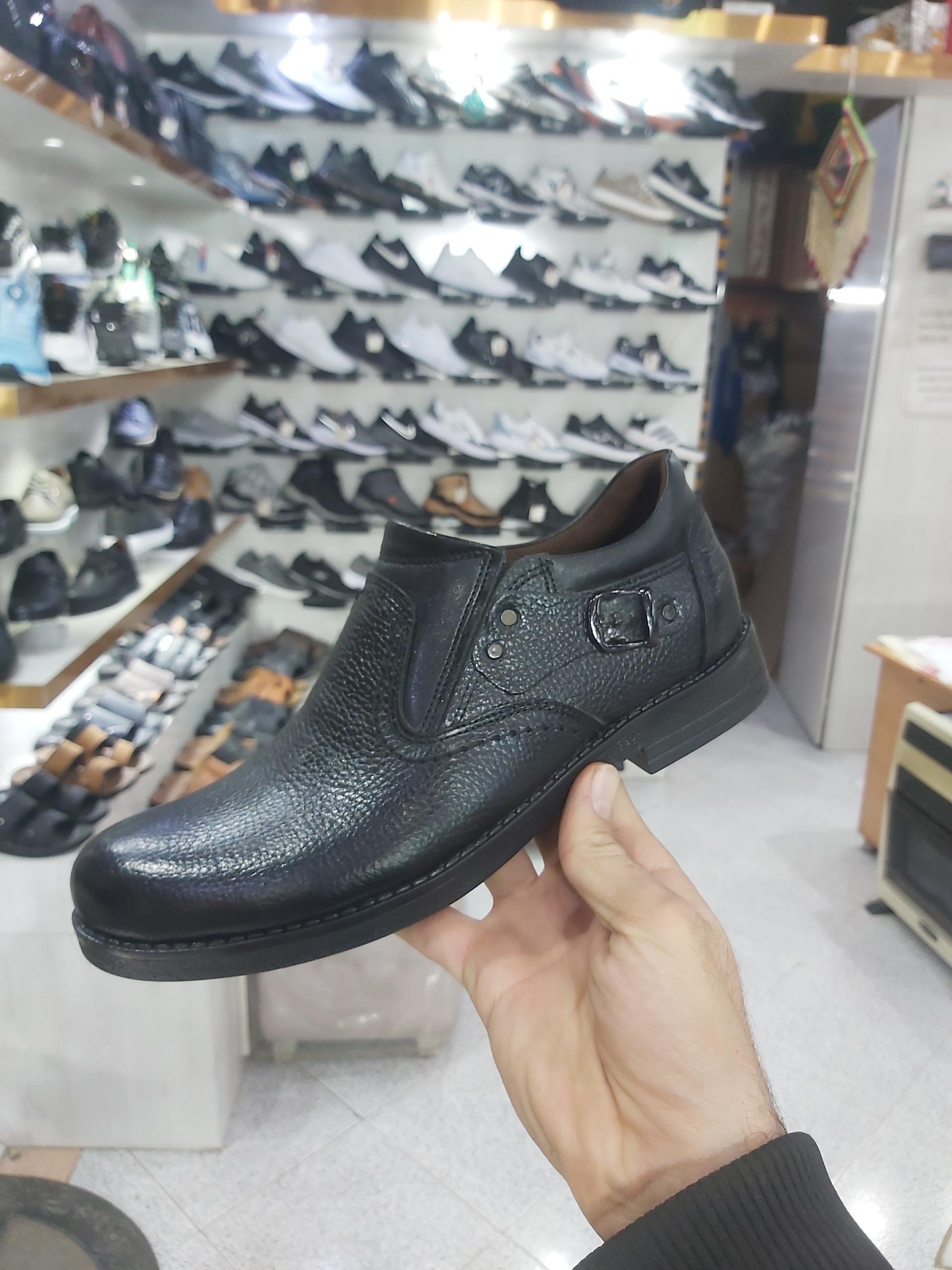 عکس فروشگاه کیف و کفش هلیوس