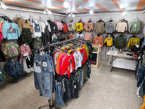 عکس پوشاک کودک تاج