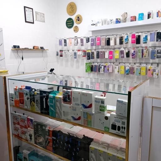 عکس تعمیر موبایل و لوازم جانبی قائم