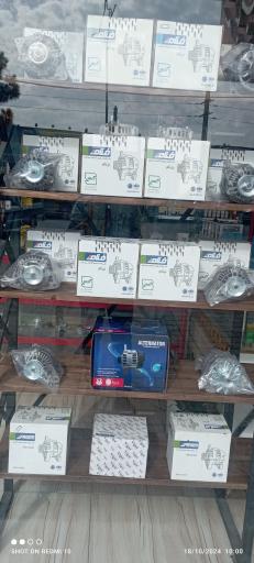 عکس لوازم برقی خودرو و باطری سازی عباس