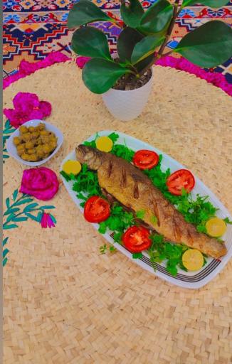 عکس کافه رستوران اکبرجوجه برادران کلبادی لاهیجان 