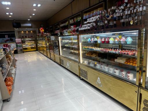 کیک و شیرینی طاهر