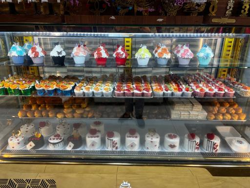 کیک و شیرینی طاهر