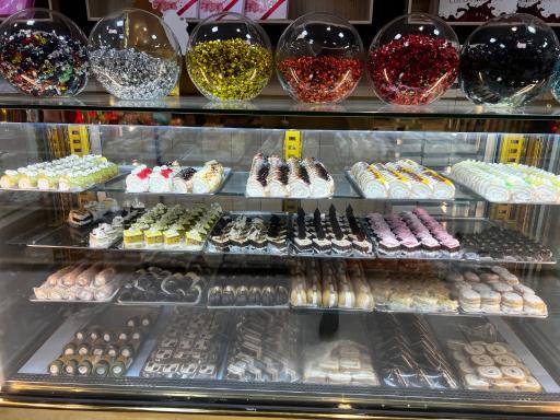 کیک و شیرینی طاهر