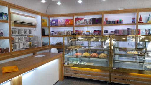 عکس شیرینی سرای قصر شهر