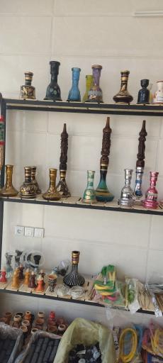 عکس پخش زغال تنباکو و موادغذایی احمد