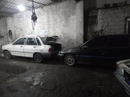 عکس مکانیکی پدر و پسر