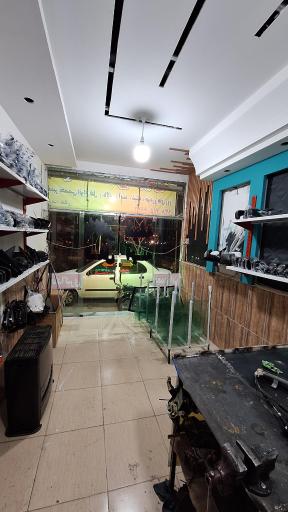 عکس تعمیرات قفل و بالابر اتومبیل محسن