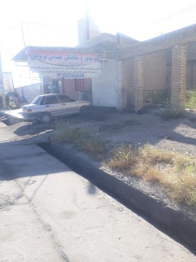 عکس تنظیم موتور و مکانیکی مهندس مربوطی