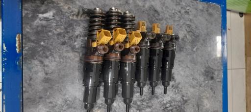 عکس تعمیر سوزن های برقی مهدی رضا زاده 