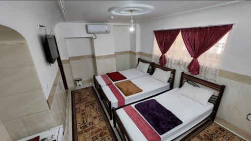 عکس خانه مسافر شریف
