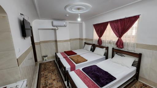 عکس خانه مسافر شریف