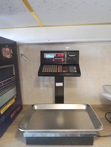 عکس ترازو باسکول و تجهیزات فروشگاهی کیل اسکیل