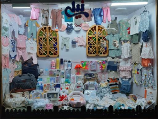 عکس سیسمونی و پوشاک نیلی