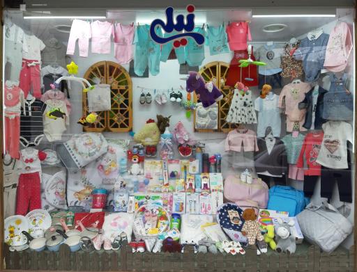 عکس سیسمونی و پوشاک نیلی