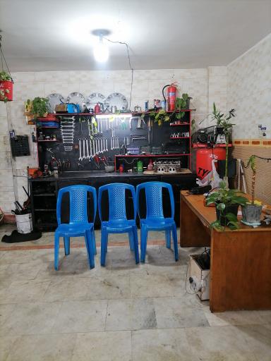 عکس تعمیرگاه و تنظیم موتور رالی