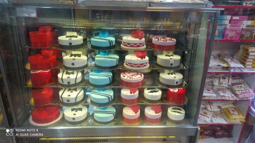 عکس شیرینی لادن حاجیان