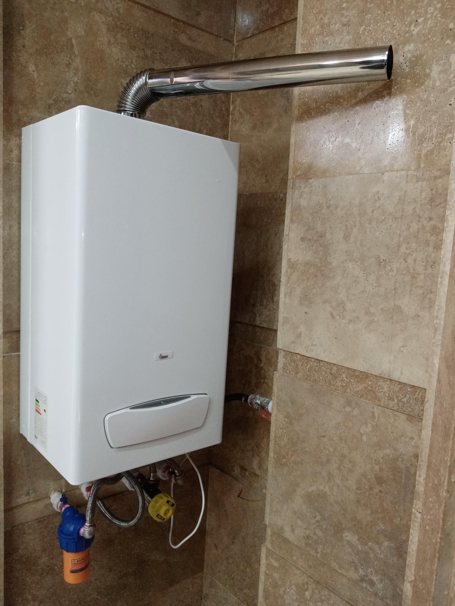 عکس تعمیرات پکیج و آبگرمکن شمال پکیج